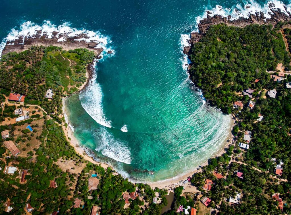 Best time to visit Hiriketiya Beach in Sri Lanka, aerial landscape view, only minutes from The Nest Sri Lanka.