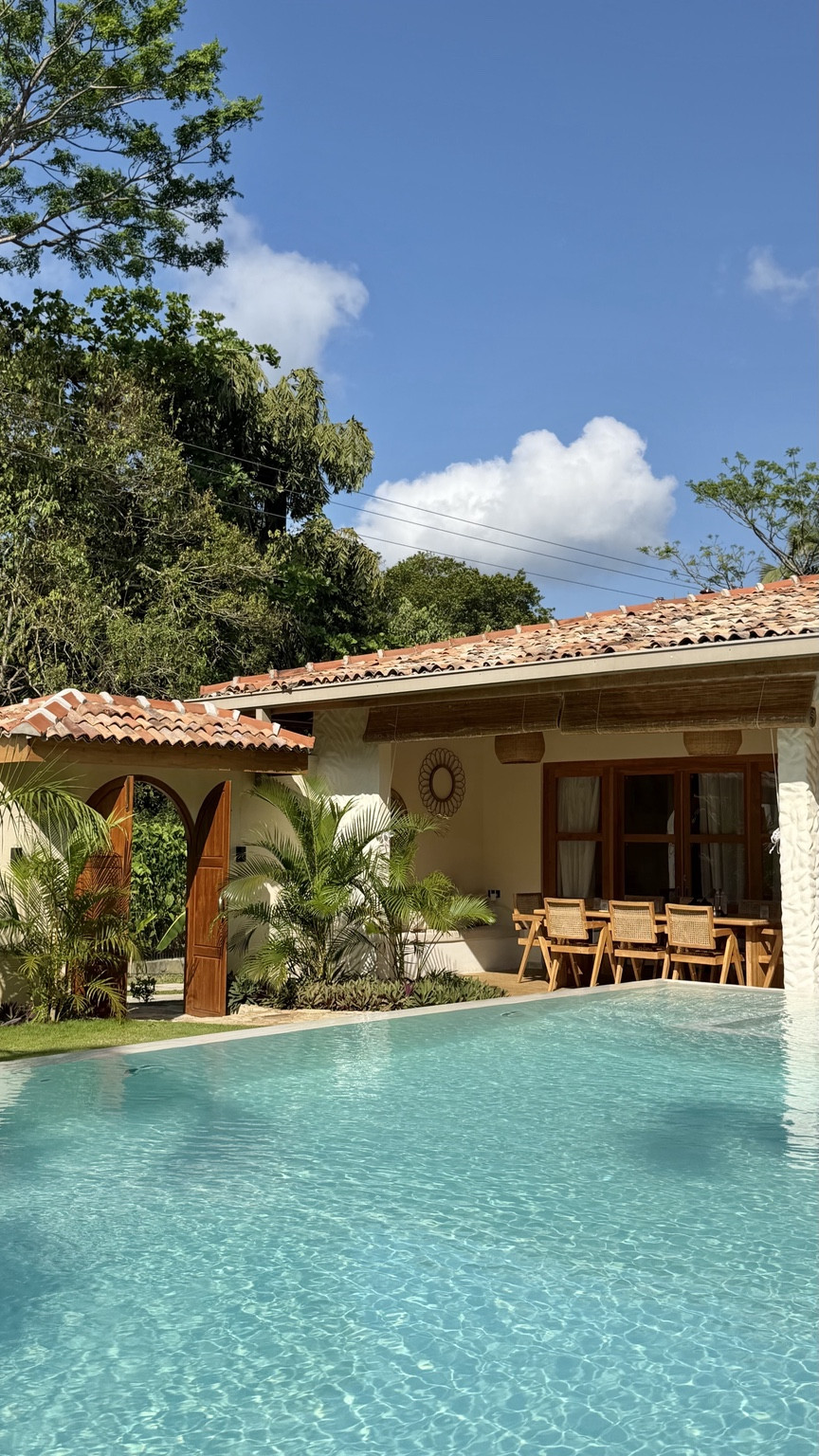 Private swimming pool and tropical villa exterior at the Nest Sri Lanka near Hiriketiya beach.