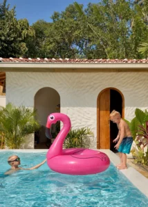 Children playing in the private swimming pool at The Nest Sri Lanka, a family friendly villa near Hiriketiya beach.
