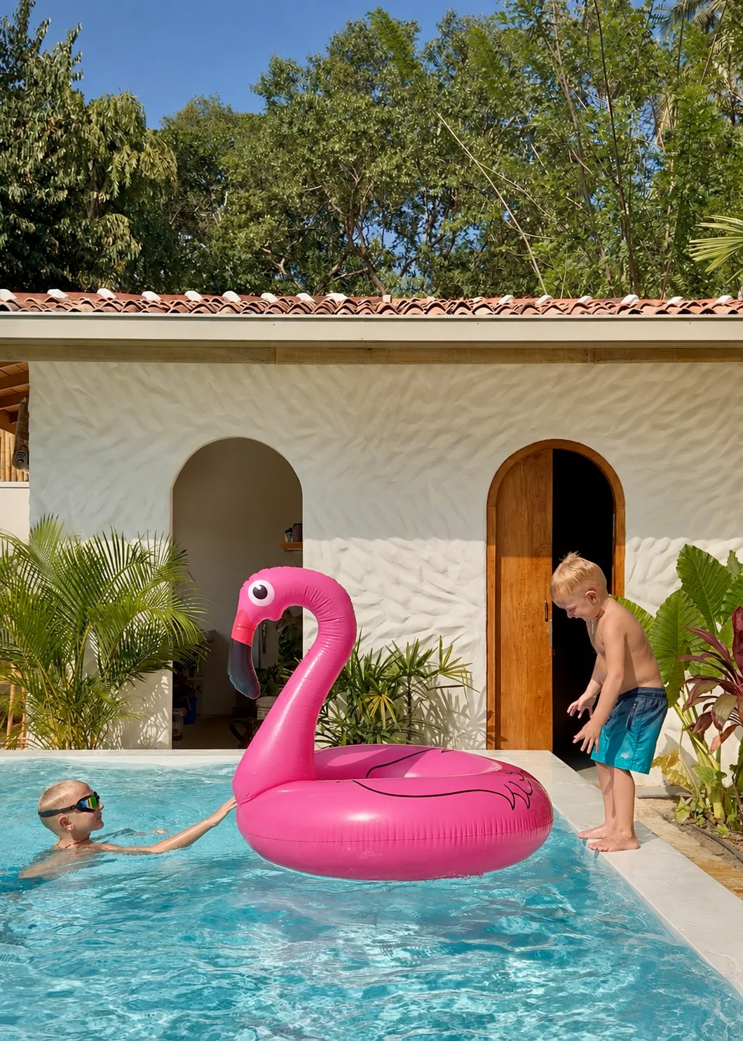 Children playing in the private swimming pool at The Nest Sri Lanka, a family friendly villa near Hiriketiya beach.
