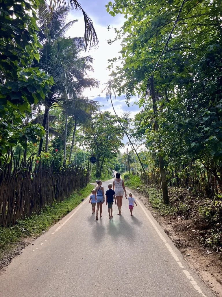 Walking the back streets of Hiriketiya with kids and Nilwella. 