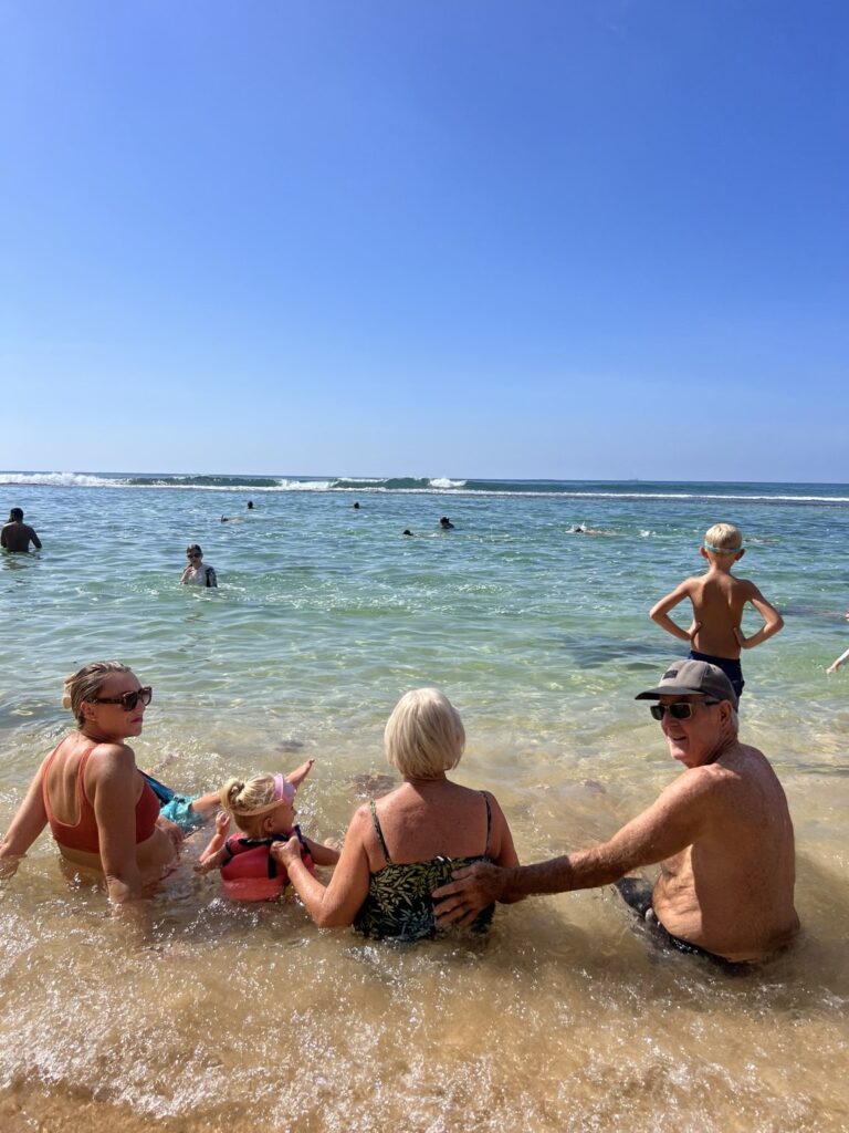 Family time at the beach and swimming with the turtles at Turtle Point.