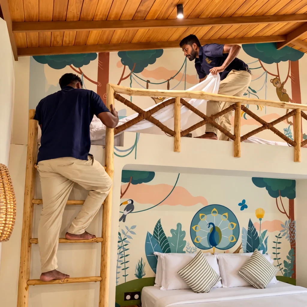 The Villa hosts preparing our family room for guest arrival.